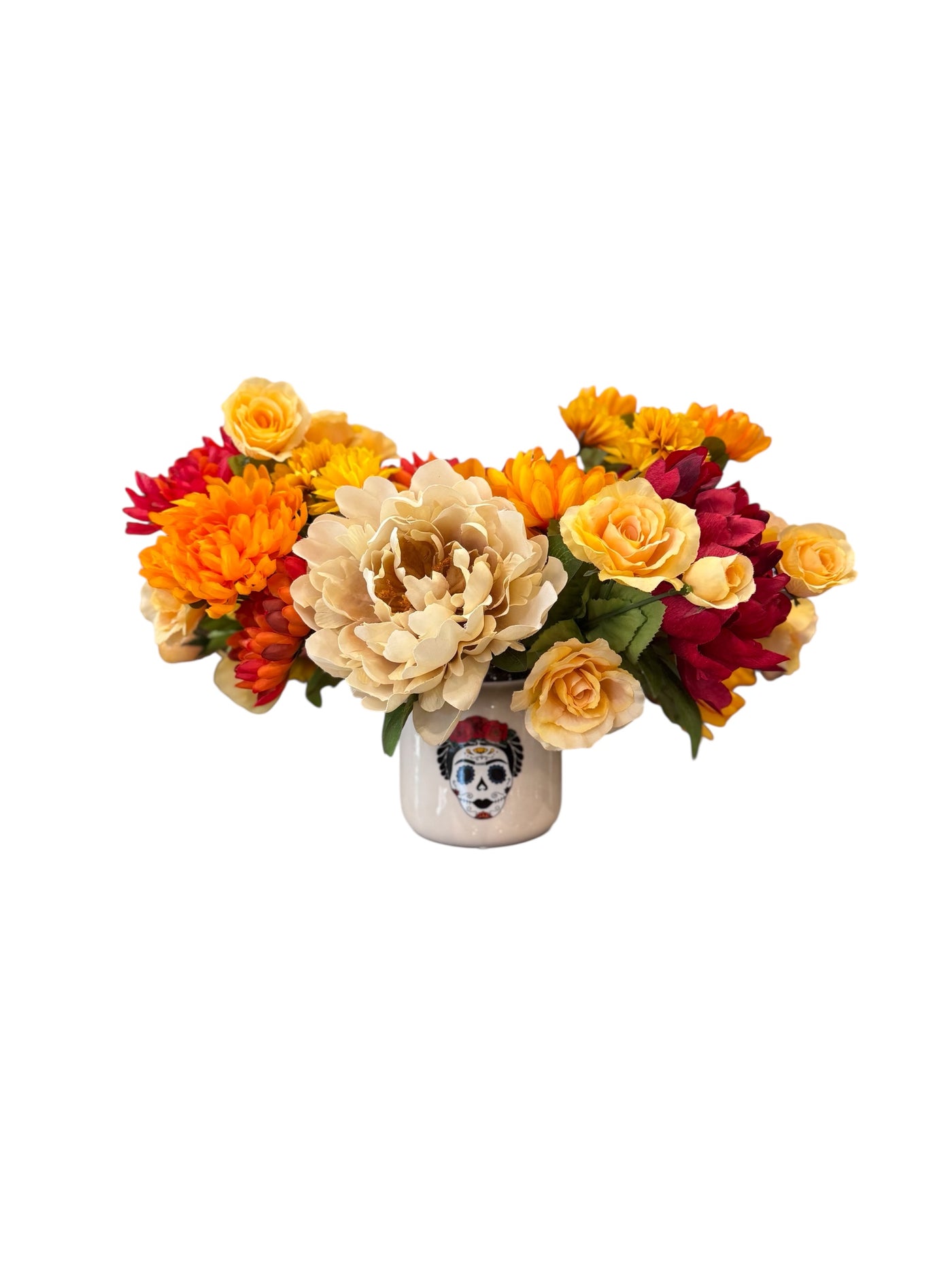 Decorative skull vase with colorful flowers 