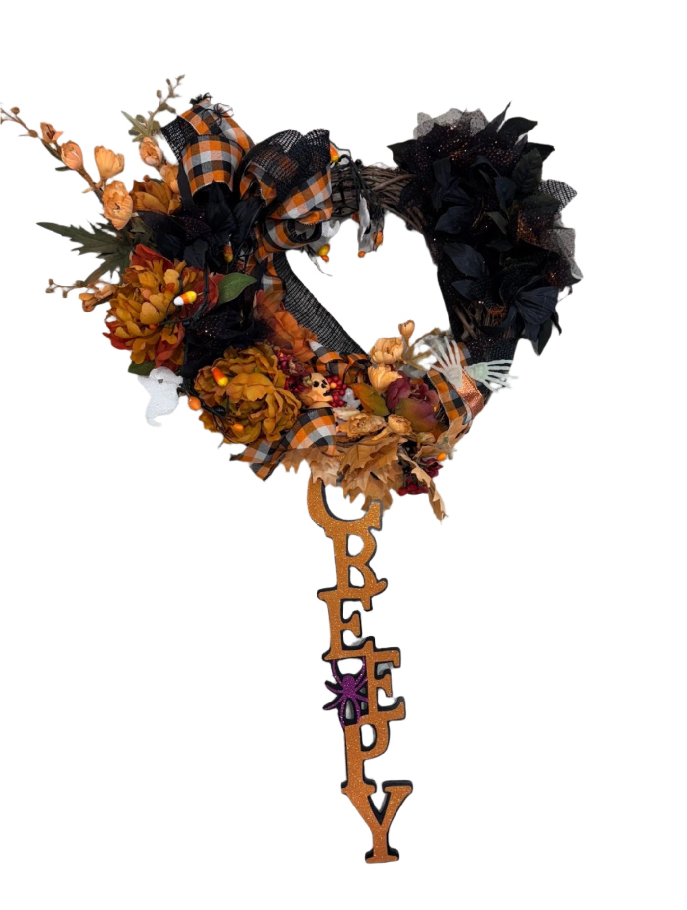 Wreath with Halloween orange and black ribbons and faux flowers and sign that says creepy hanging from wreath